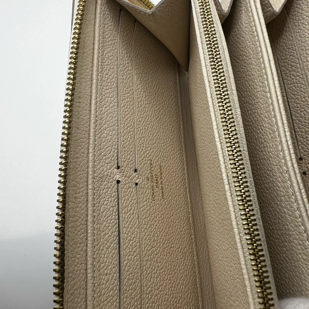 GUC Louis Vuitton Monogram Cream Empreinte Zippy Wallet - Picture 5 of 11